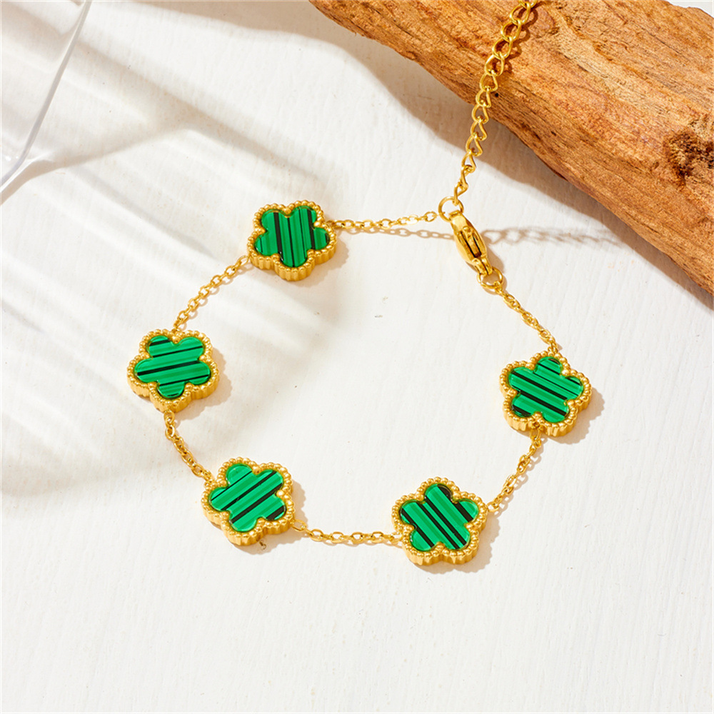 Nueva moda europea y americana no-desvanecimiento de acero de titanio de cinco hojas serie de trébol de moda de lujo ligero espárragos pulsera collar traje