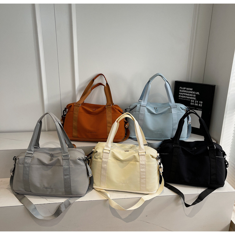 Transfronterizos nuevos bolsos deportivos portátiles casuales de alta capacidad de viaje multifuncional bolsa de hombro bolsa de embarazo