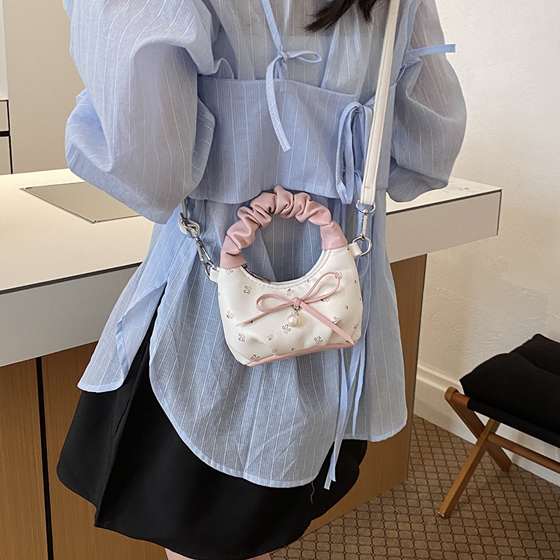 Nuevo bolso para niños dulce pequeña flor fresca bolso de hombro de niñas lindas bolsas de mano de arco plegado bebé