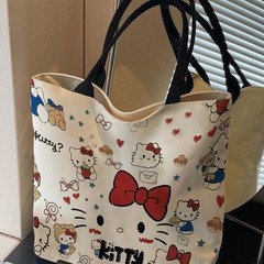 ハローキティ漫画キャンバスバッグファッションバッグレディースハンドバッグかわいい通勤多用途ショルダートート大容量