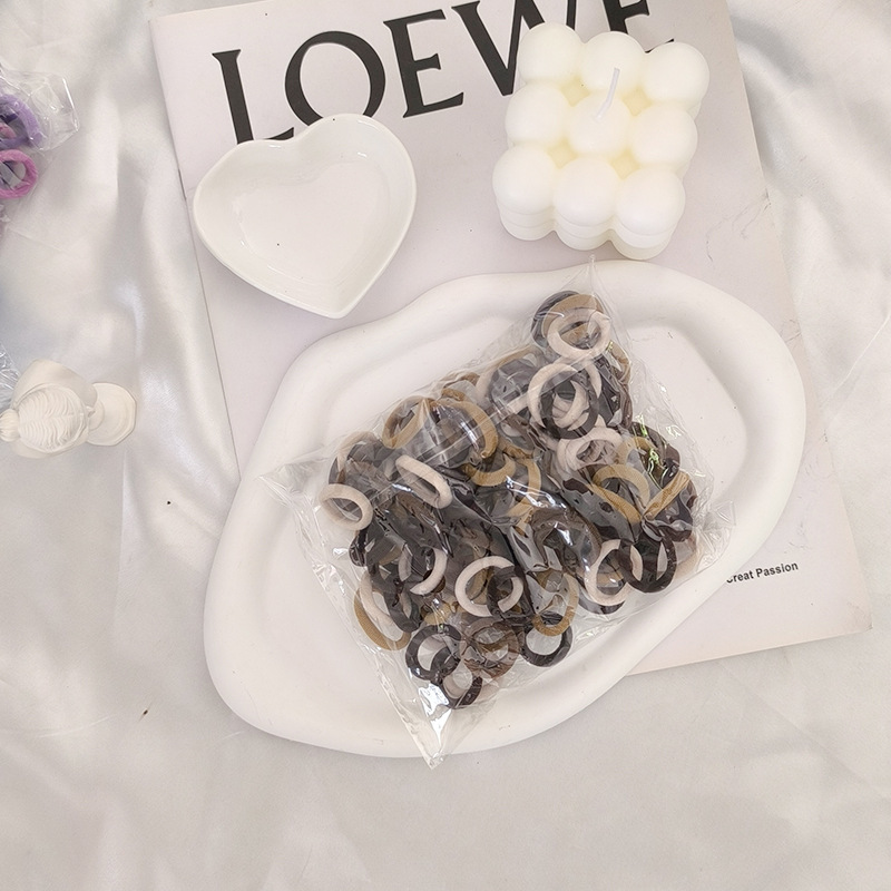 Solo al por mayor cuerda de pelo negro banda de pelo femenino estilo coreano alta elasticidad no duele el pelo banda de goma corbata alta Cola de Caballo accesorios para el cabello del bebé