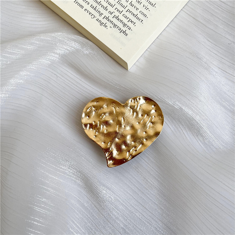 Retro estilo frío metal airbag soporte perezoso soporte de escritorio pegatina retráctil plegable cojín de aire soporte del teléfono móvil