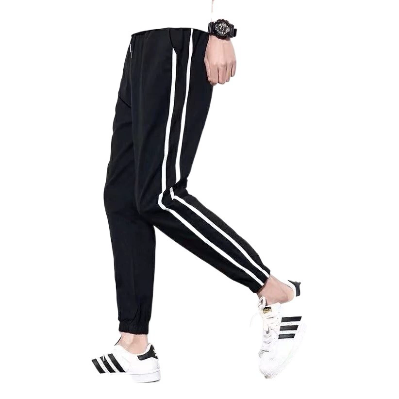 Весна и лето 2021 Мужские спортивные брюки Свободные повседневные брюки больших размеров Корейские модные ножки для молодых мужчин