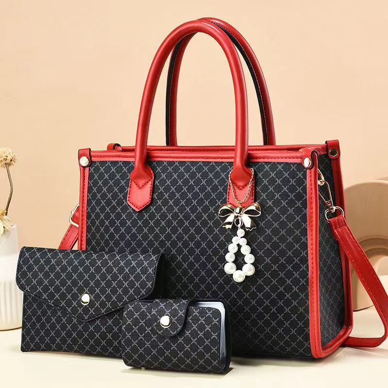 2026 nueva tendencia transfronteriza tres piezas paquete de bolsas para niños y madres, bolsas de mano portátiles de hombro simple y de gran capacidad