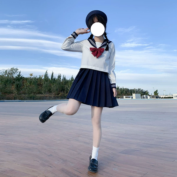 Long-sleeve, mini-skirt, bow tie