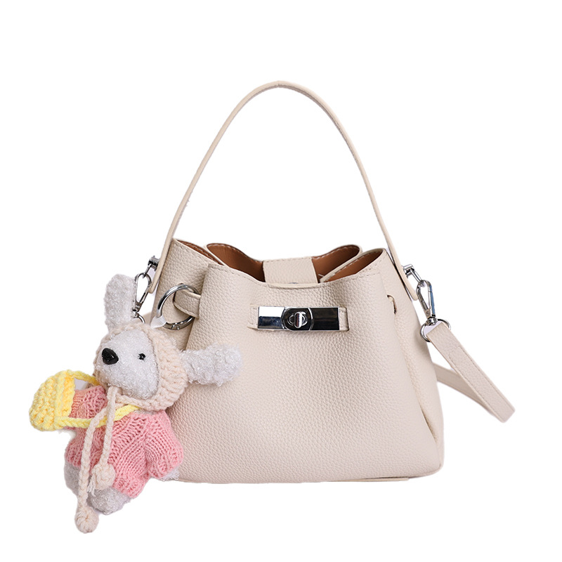 Coreano de nicho de alta calidad canasta de verduras, bolso de cubo de mano para mujeres 2026 nuevo estilo extranjero, lujo ligero y versátil bolso de mochila