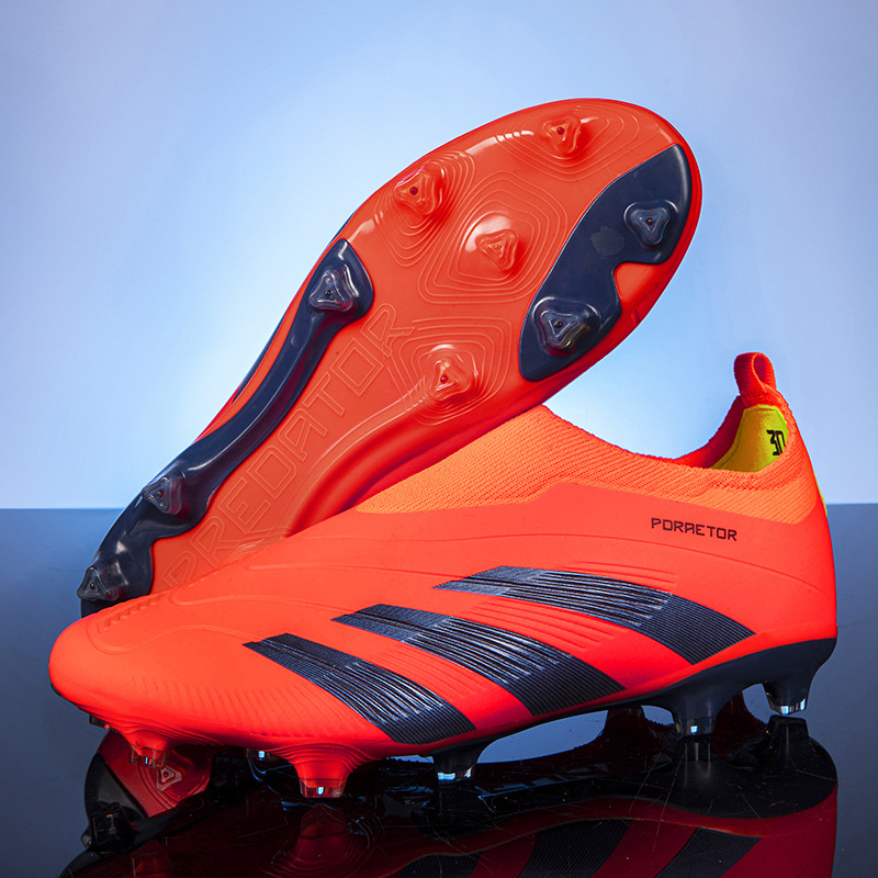 Zapatos de fútbol transfronterizos sin costuras cortados tf clavos de clavos adultos AG clavos niños y niñas zapatos de entrenamiento de estudiantes al por mayor