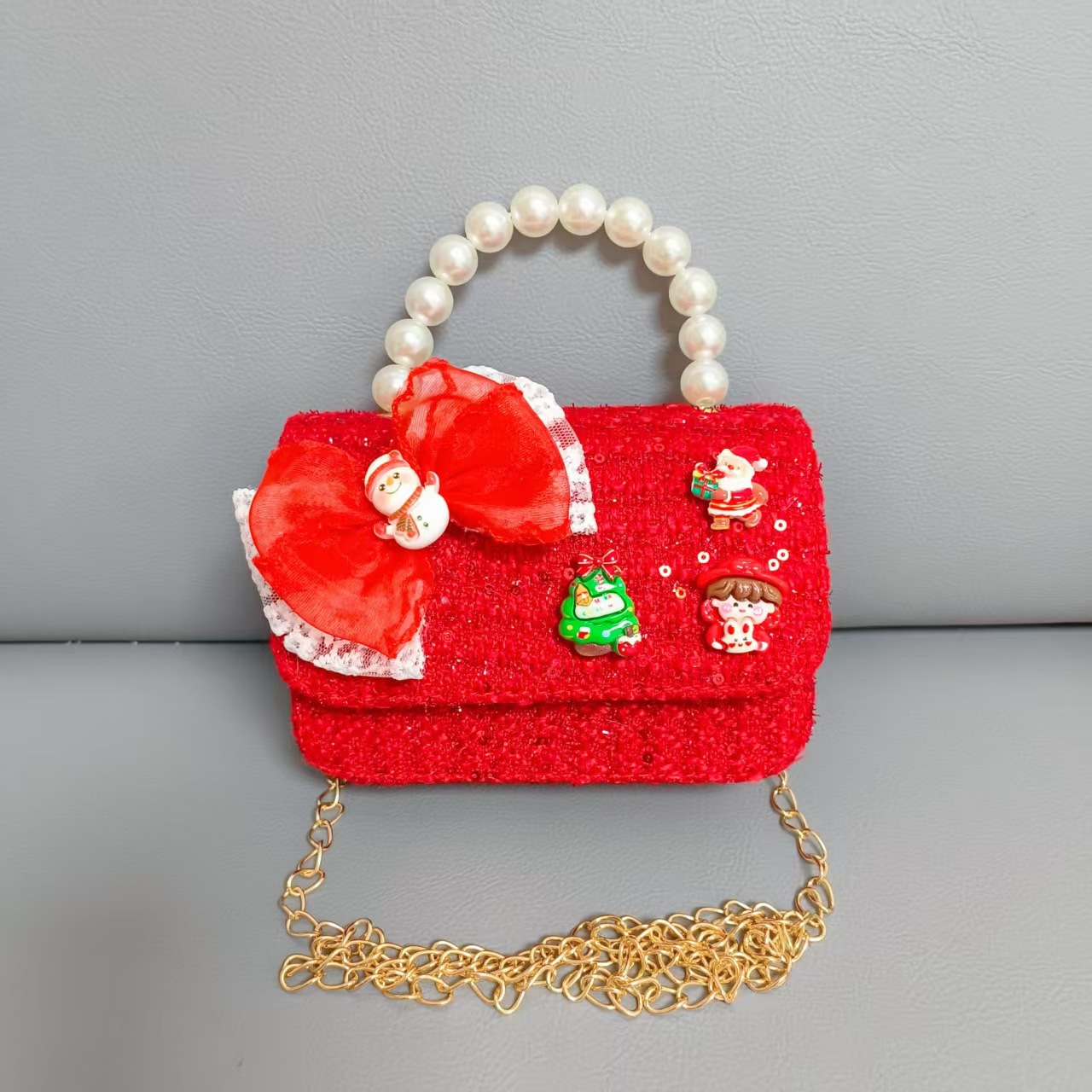 Cartera de Año Nuevo rojo arco de papá Noel bolso de perla pequeña cadena de viento fragante bolso de hombro