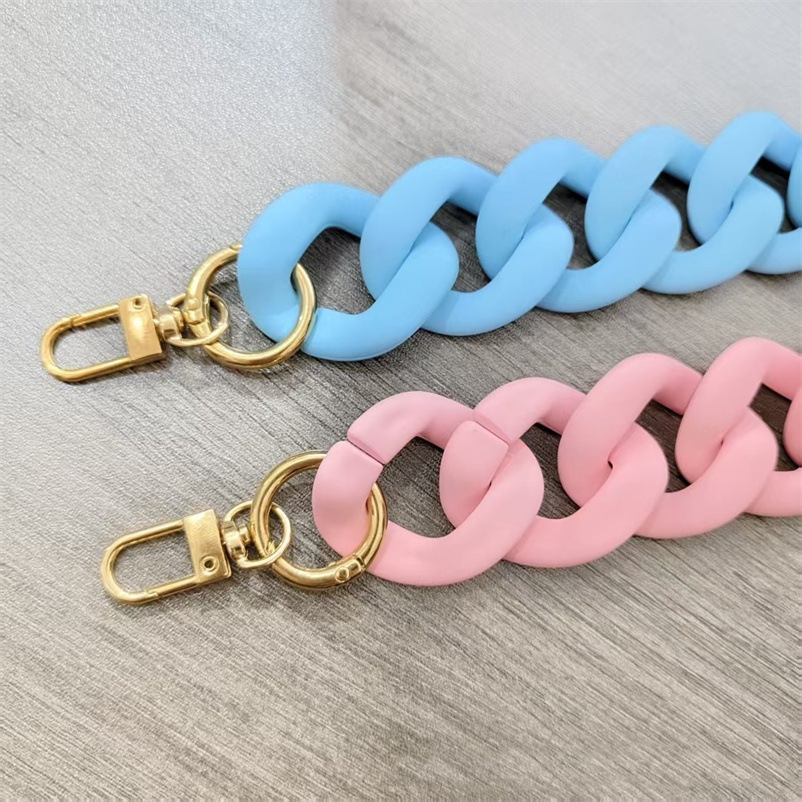 Fashionable acrylic golden keychain on chain