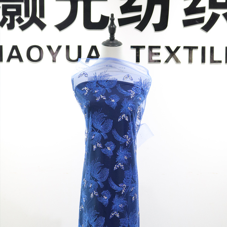 Xiaoyuan nuevo tejido de malla de malla de malla de oro pulverizado de oro multi-juegos de dos colores paleta tela de vestido de boda al por mayor