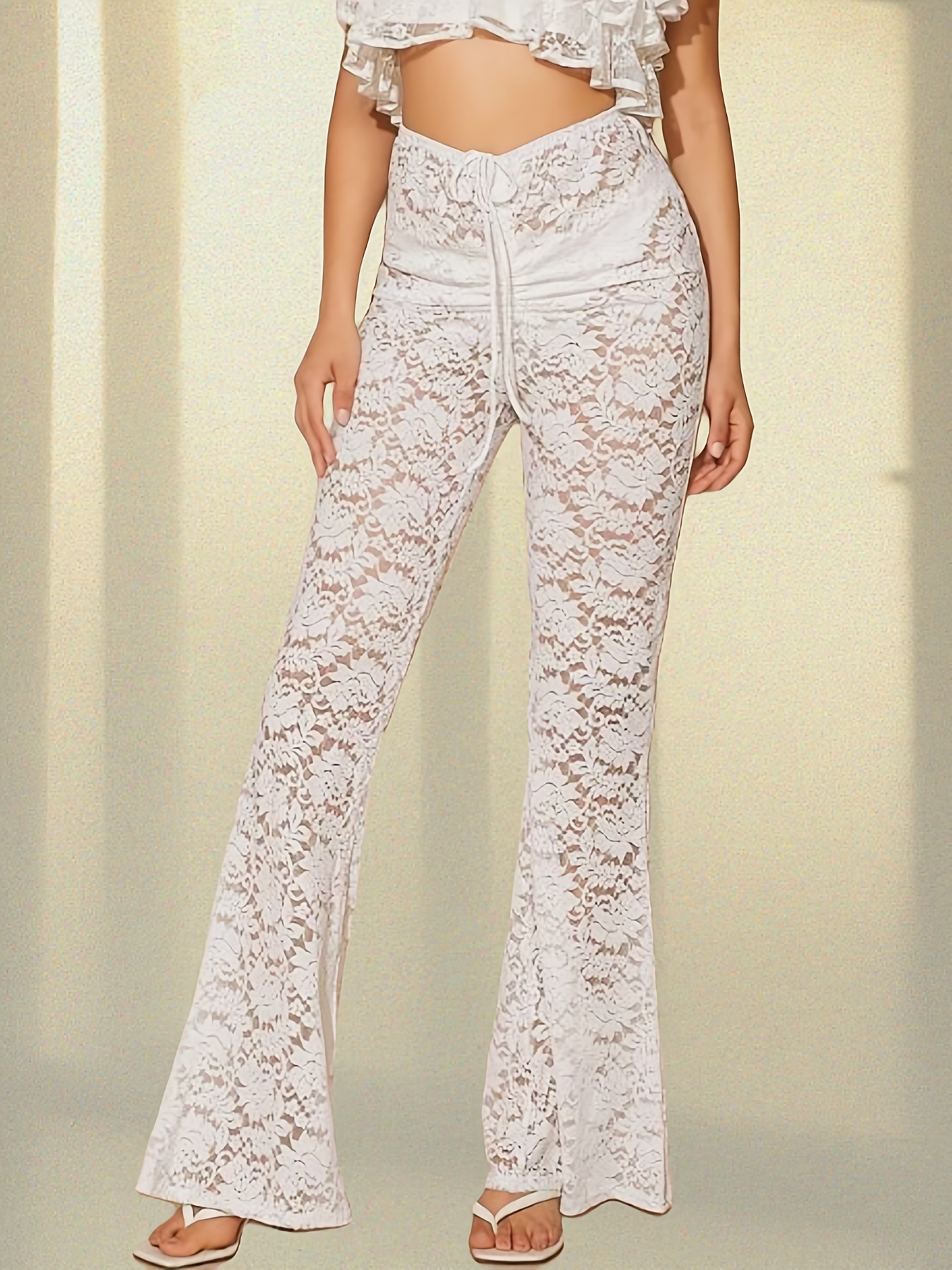 Calças flare em renda transparente cintura alta estilo boho chic_voghion.com