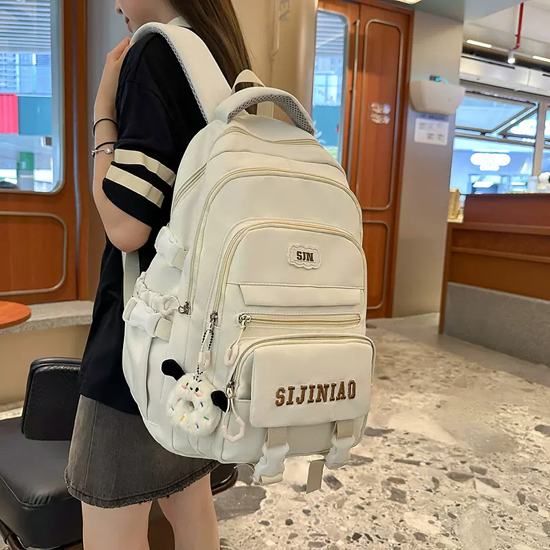 新款纯色大容量双肩包男女初高中大学生书包轻便简约双肩包旅行包