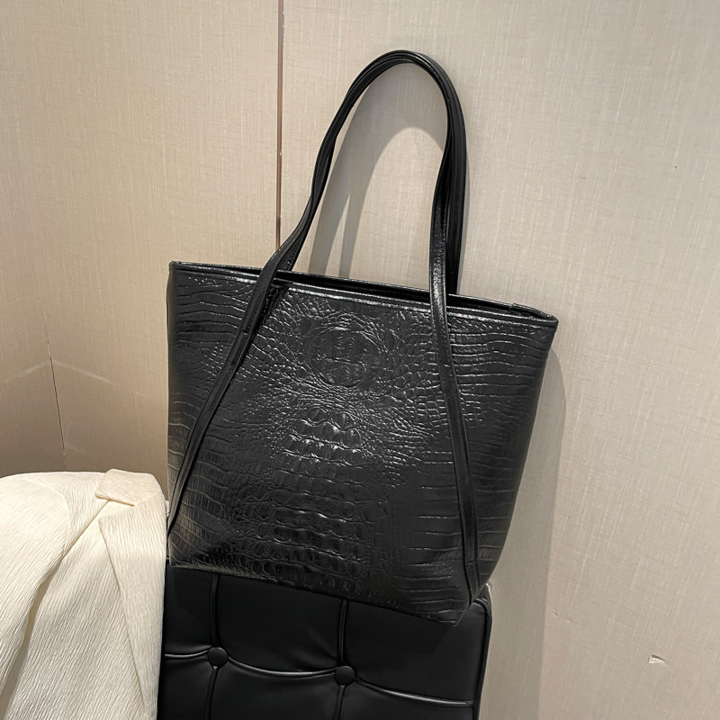 Textura de gran capacidad bolso de brazo bolso de mujer 2025 nuevo estilo de viaje simple bolso de hombro de mano de moda bolso de moda