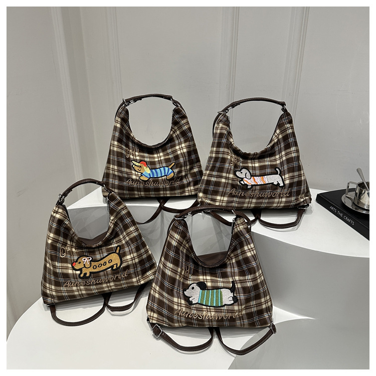 A new 2024 trendy and stylish backpack for women, featuring a cartoon checkered single-shoulder crossbody bag and a tote bag undefined