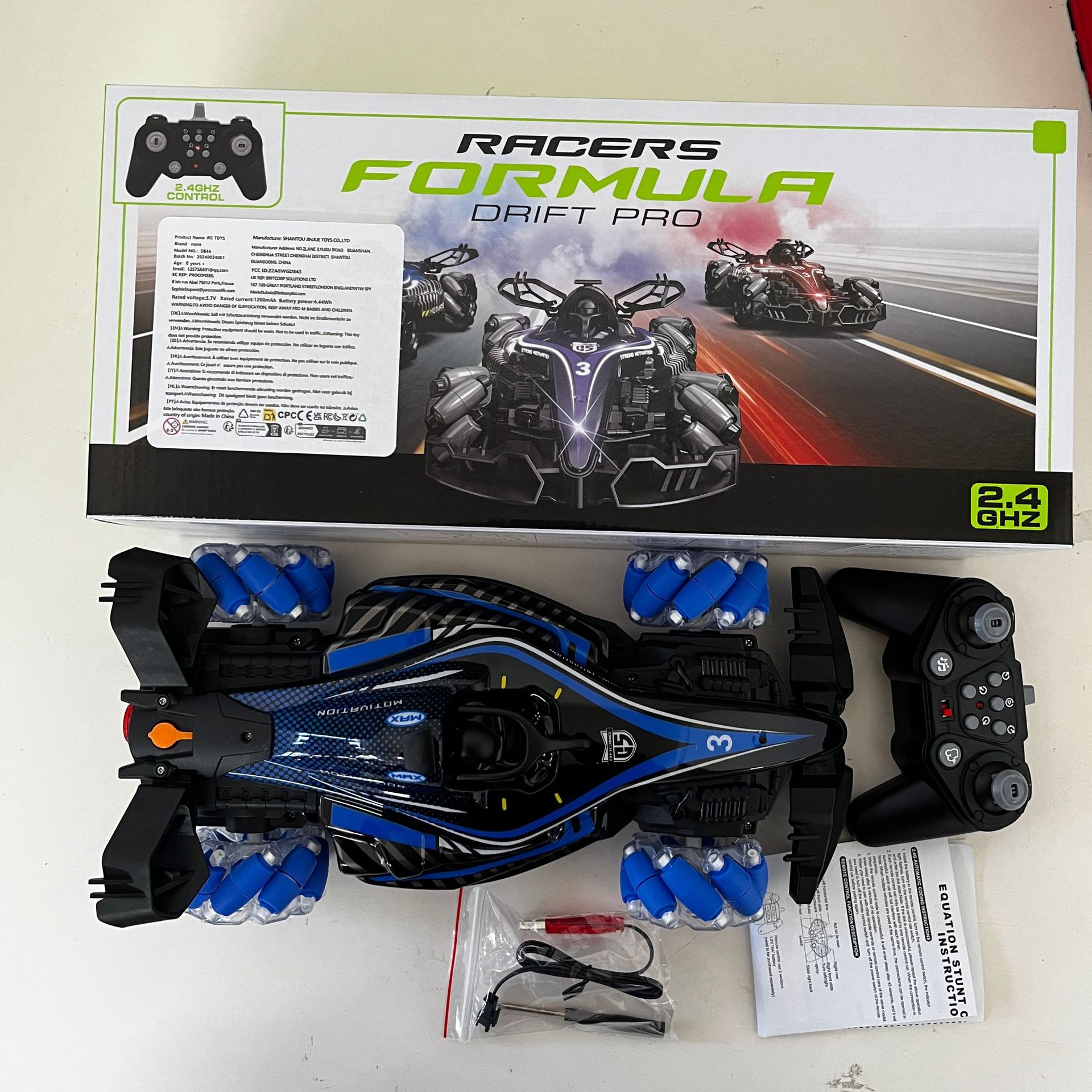 Ventas transfronterizas de alta velocidad de deriva de Fórmula 1 coche de control remoto 2.4G eléctrico cool iluminación coche de carreras spray coche de acrobacias