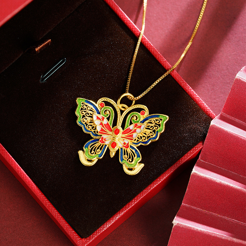 La herencia de la antigua ley de oro de arena vietnamita mariposa hueca color esmalte colgante de moda popular de moda nacional fuente popular