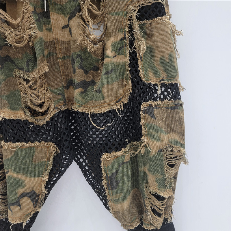 Personalidad nicho moda mujer 2025 verano nuevo estilo malla hueca costura nueve puntos camuflaje pantalones de entrepierna