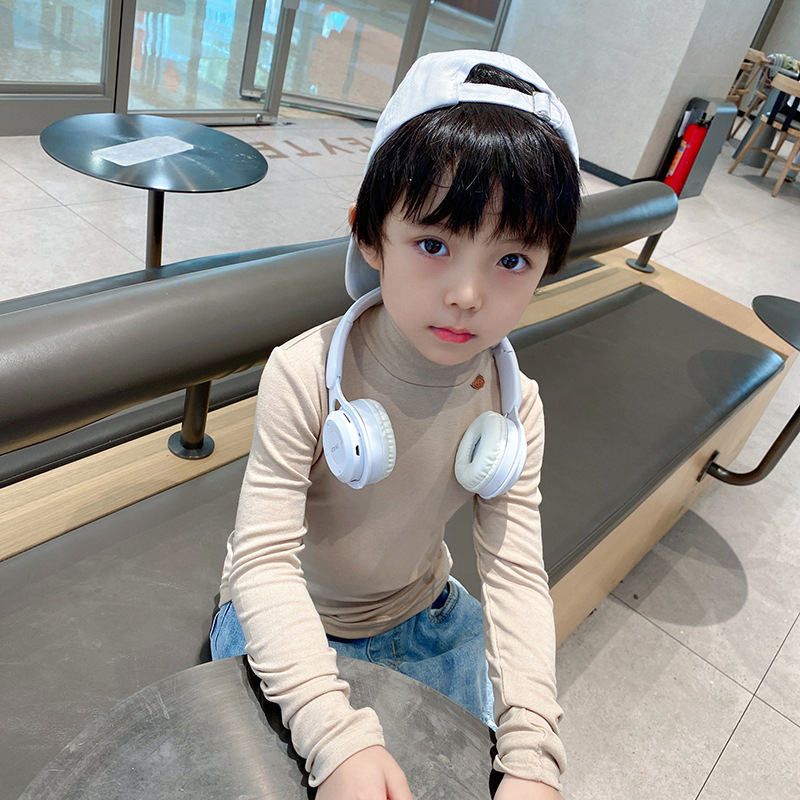 Ropa de otoño e invierno para niños nuevo estilo coreano color sólido camiseta de los muchachos medio cuello alto camisa de fondo para niñas engrosada bebé manga larga superior