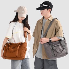 时尚男女同款包包2025秋季新款单肩腋下包大容量托特包潮流通勤包