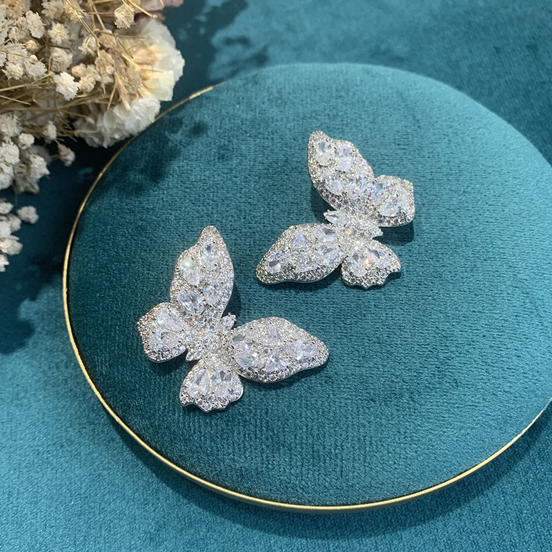 Boucles D&#39;oreilles Mode Papillon Blanc En Cuivre Zircon display picture 1