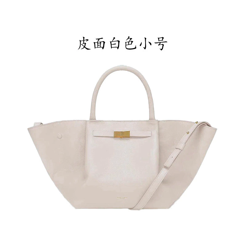 Handheld capacious purse, shoulder bag