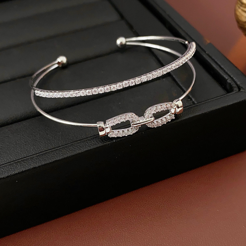 Pulsera de apertura geométrica irregular metálica europea y americana, personalidad exagerada, temperamento de nicho simple, joyería de alta gama femenina