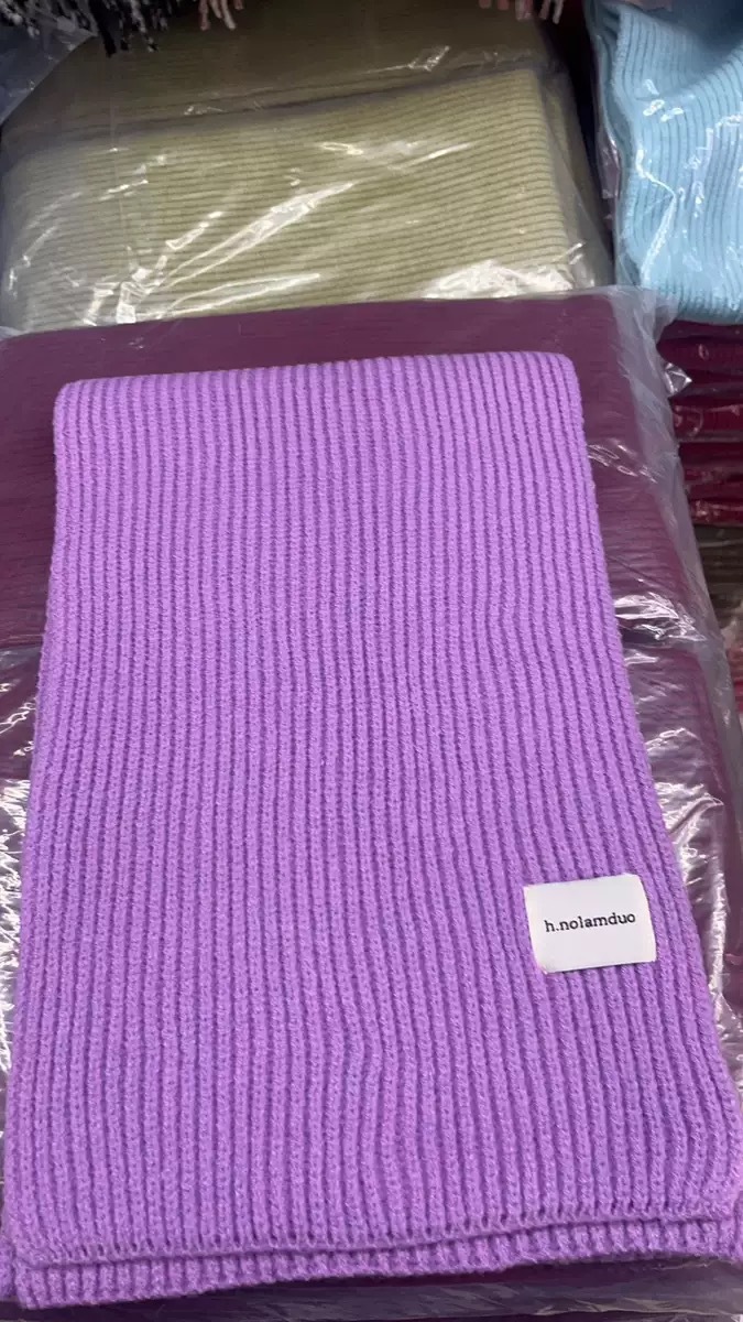 純色のニットのマフラーの女性秋冬の韓国版の学生の毛糸の百合の保温の厚いマフラーのカップルの潮男のカップル