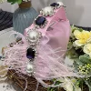 Сакуровый розовый (с аметистом, со страусиным пухом)