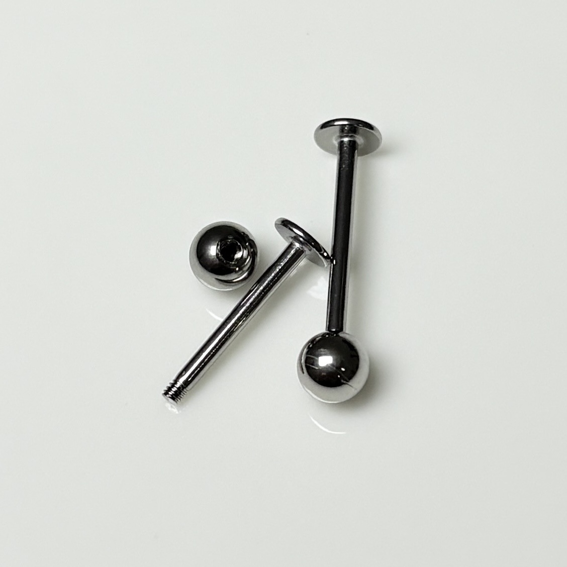 Labret stud lip piercing jewelry styling detail