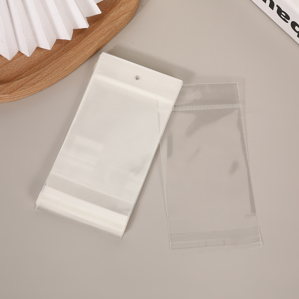 Fábrica directa de aretes explosivos joyas de embalaje tarjeta de papel de hierba tarjeta blanca en stock al por mayor