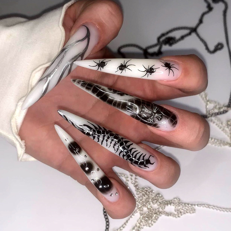 Wear armour European and American crocodile pattern silver flame black spider manicure false nails long pointed nail pieces finished wholesale Wear armour European and American crocodile pattern silver flame black spider manicure false nails long pointed nail pieces finished wholesale