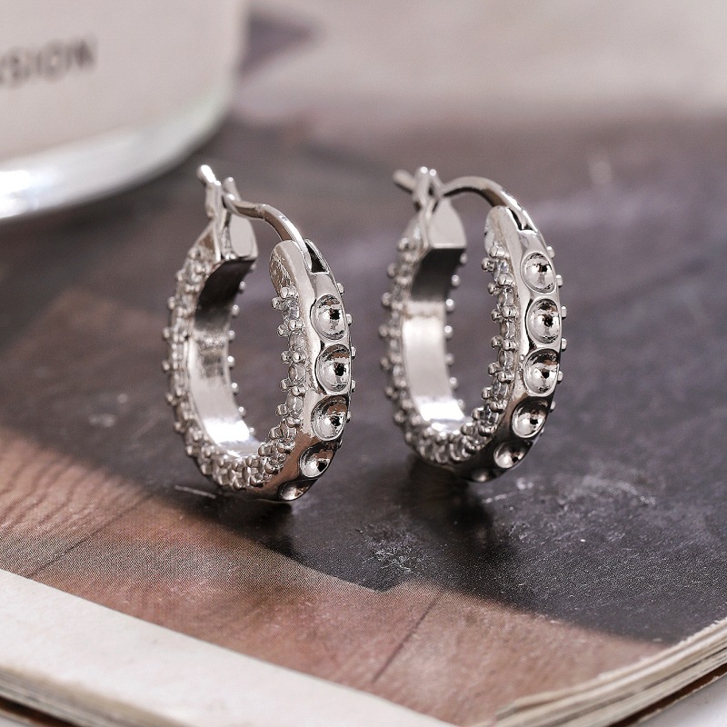 Pendientes exagerados transfronterizos europeos y americanos de alto sentido nicho geométrico pendientes redondos Luz de lujo pendientes de diamantes de personalidad femenina al por mayor