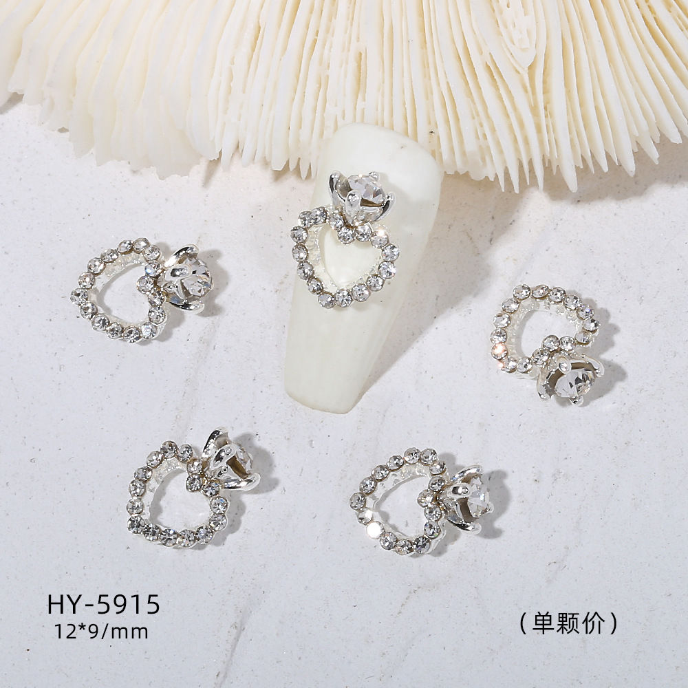 Venta caliente taladro de uñas arco de plata joyería tridimensional flash diamante esmalte de uñas decorativo diamante acabado pieza de uñas traje de joyería