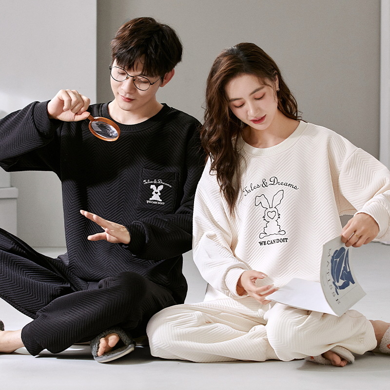 El otoño y el invierno sándwich de manga larga pareja pijamas engrosada de dibujos animados cuello redondo jersey de los hombres y las mujeres de ropa de casa caliente se puede usar fuera