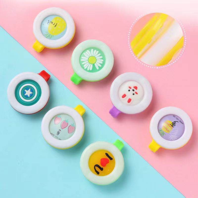 Fábrica directa de dibujos animados para niños viajes al aire libre botón de protección para bebés juguetes embarazadas perfumados botón de cuerpo sólido