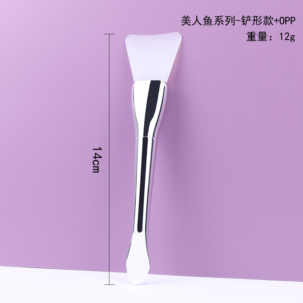 Cepillo de mascarilla de silicona tipo pala de cola de pez todo en uno plateado