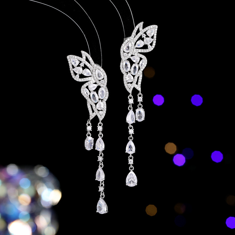 Boucles d'oreilles en argent S925 avec aiguille Ankara et zircon rouge Boucles d'oreilles en forme de goutte d'eau à longues franges en forme de papillon_voghion.com