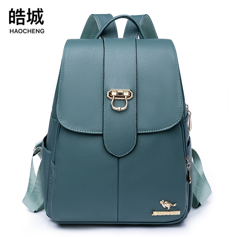 Comercio exterior al por mayor 2023 nueva mochila de cuero suave para mujer coreana, mochila de viaje antirrobo de gran capacidad de color sólido de moda