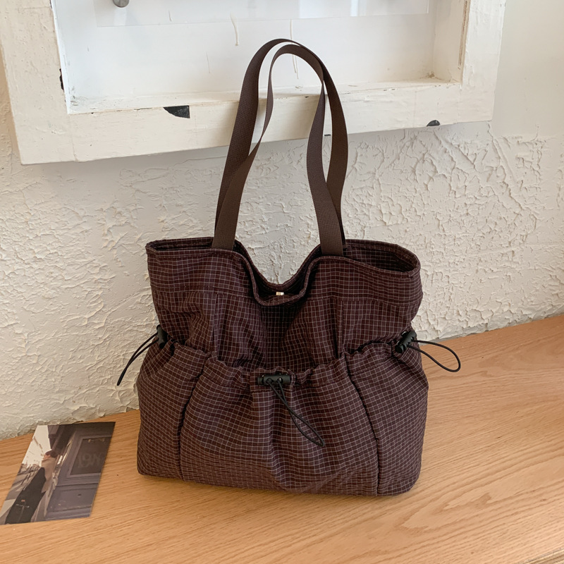韩版时尚格纹托特包2025新款大容量洋气抽绳单肩包爱的慵懒通勤包