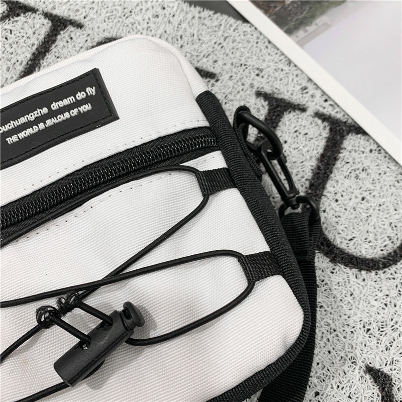 67g Weight Zipper Closure Type Single Shoulder Strap Strap Type Crossbody Bag Bags Type Nylon Material Letter Pattern Streetwear Style Square Shape Khaki, Light Grey, White, Black Color Small Size Small Nylon Letter Streetwear Square Zipper Crossbody Bag 85