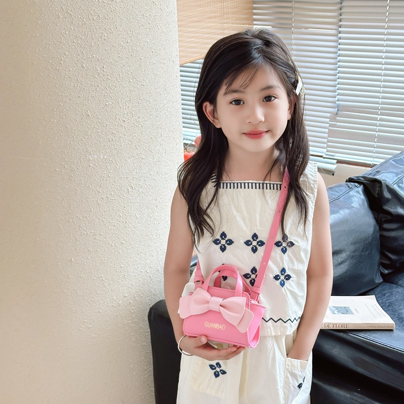Nuevo tipo de bolso de hombro para niños y niñas, estilo coreano de moda, bolso de arco para niños 2024, bolso mini de estilo extranjero
