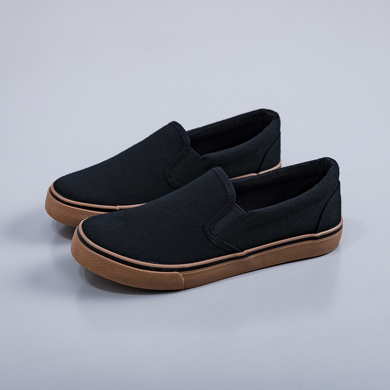 2025 zapatos de lona negros zapatos blancos perezosos un pedazo de primavera coreana para hombres y mujeres zapatos elásticos de estudiantes