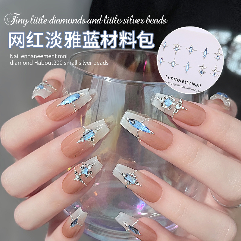 Manicura mini bola de acero plana diamante Internet celebridad Luz elegante azul paquete de material rhinestone mezclado pequeña joyería avanzada decoración al por mayor