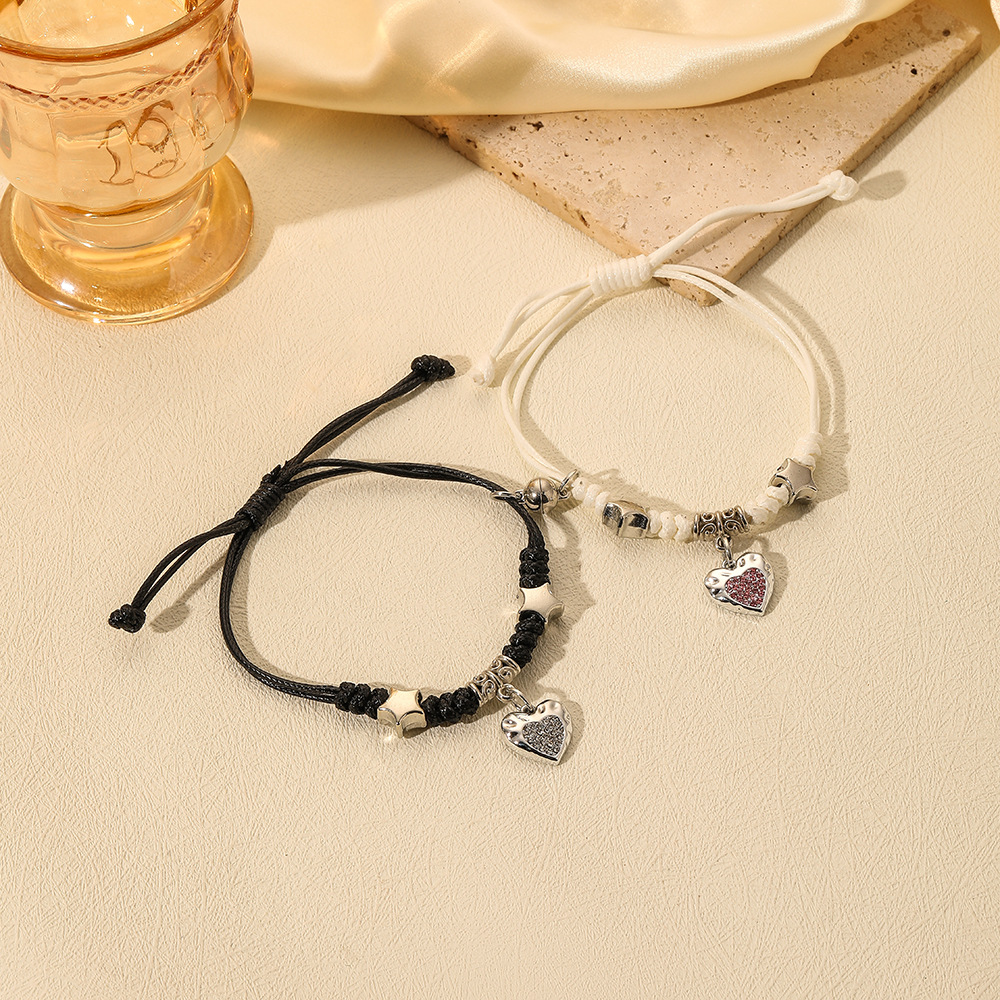 Moda europea y americana simple creativa ins blanco y negro con pareja cruzada cuerda tejida a mano traje pulsera