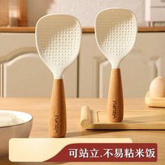 シリコンしゃもじは、炊飯器に置くために立てて使用できます。食品グレードの非粘着性家庭用しゃもじです。