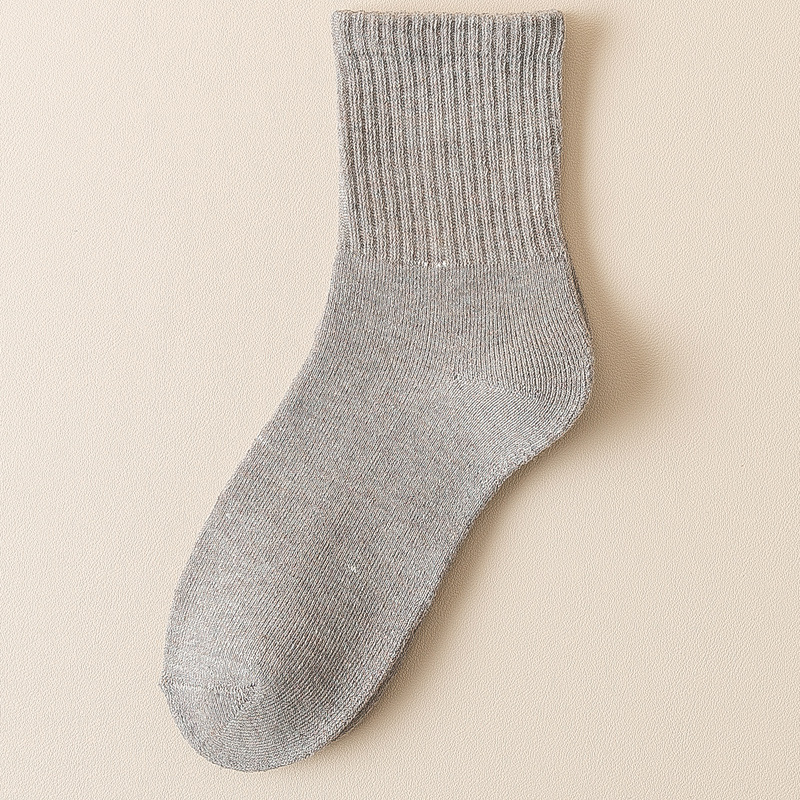 Calcetines de mujer de invierno forrado de lana gruesa caliente Terry Calcetines de piso de otoño e invierno de color sólido a media pantorrilla Zhuji calcetines al por mayor