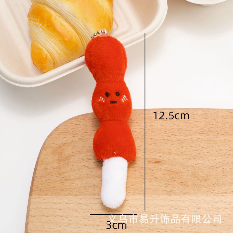 創意的な漫画の食品のぬいぐるみのペンダントの趣味は牛の角のカバンの子供の鍵を遊んでリュックサックを掛けて飾って屋台を並べて卸売りします。|undefined
