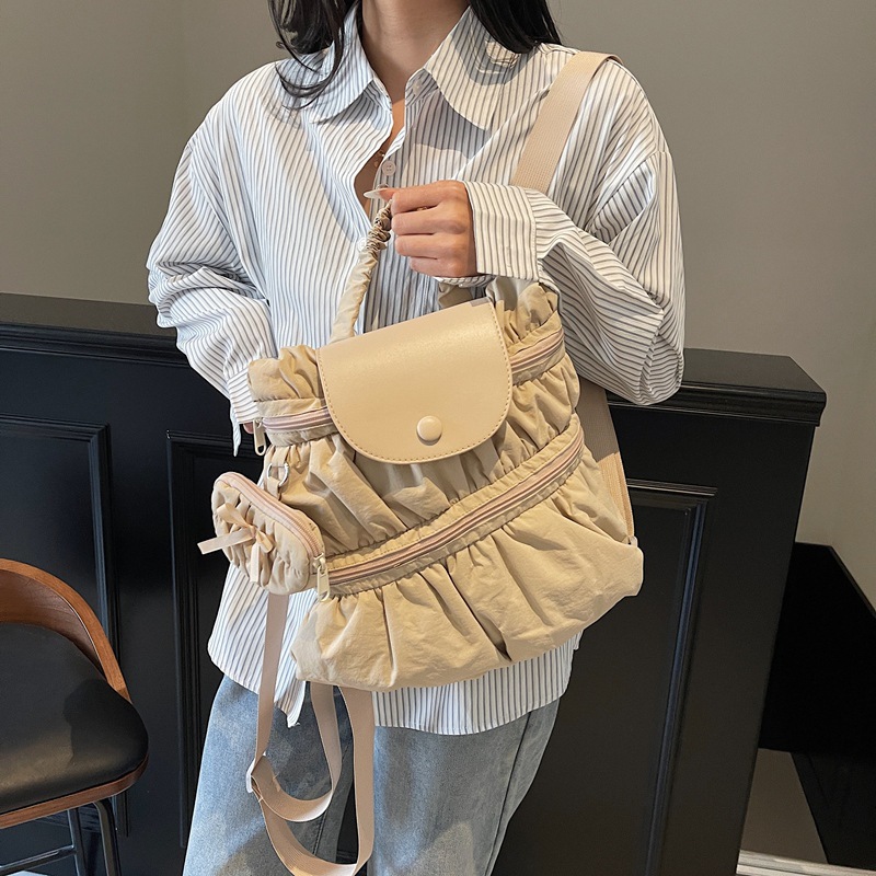 Mochila transfronteriza 2025, nueva moda coreana dulce bolso de mano plegable estilo campus bolso de escuela secundaria