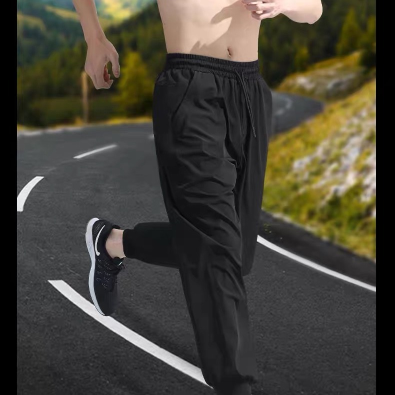 Pantalones deportivos para hombres entrenamiento de acondicionamiento físico hielo de verano delgado rápido secado ocio piezos de corrección deportiva pantalones de tejido