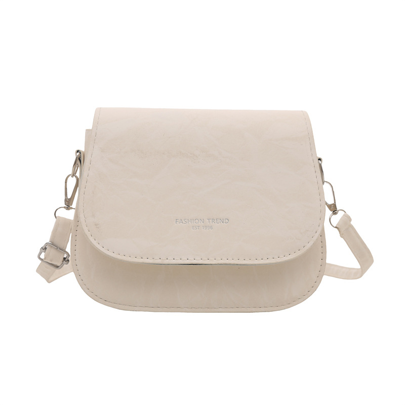 Bolso de silla de montar, bolso de mochila de mujer 2025, nueva moda de verano, moda simple, estilo extranjero, bolso de hombro para mujeres